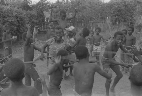 Children cheering inside boxing ring, San Basilio de Palenque, ca. 1978