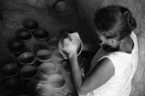 Artisan at work, La Chamba, Colombia, 1975