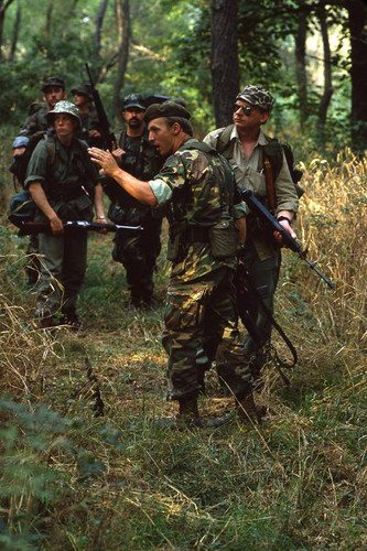 Survival school students participate in an obstacle course, Liberal, 1982