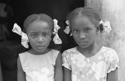 Two girls posing for a portrait, San Basilio de Palenque, 1976