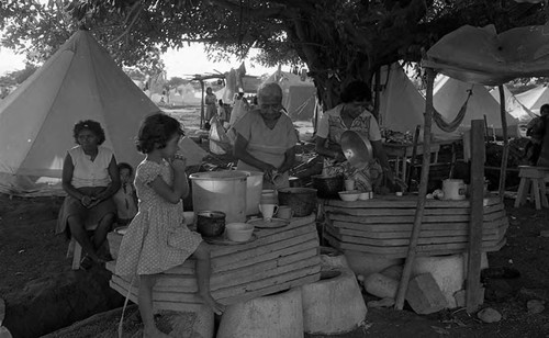 Women cleaning dishes, Costa Rica, 1979