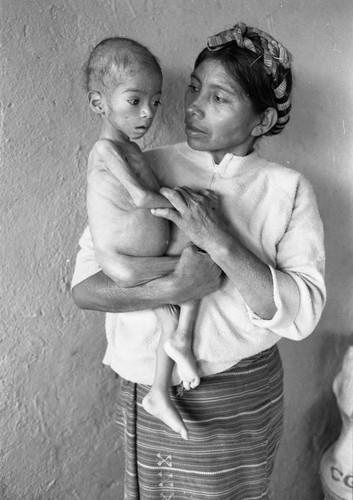 Refugee woman and malnurished child, Chiapas, 1983