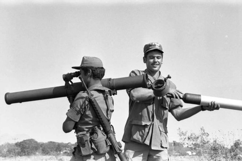 A U.S. military advisor training a Salvadoran soldier at Ilopango Military Base, Ilopango, 1983