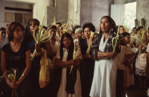 Women attending Palm Sunday Mass, San Salvador, El Salvador, 1982