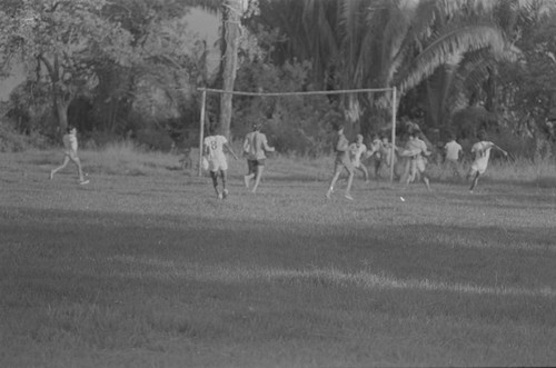 Youth playing soccer, La Chamba, Colombia, 1975