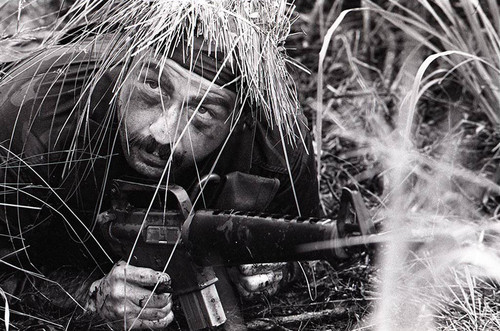 Survival school student practices silent swim techniques, Liberal, 1982