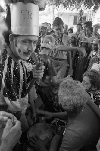 Dancers dancing among the Carnival crowd, Barranquilla, Colombia, 1977