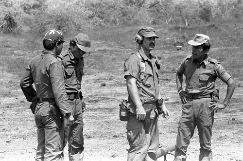 U.S. advisor training Salvadoran soldiers at military base, Ilopango, 1983