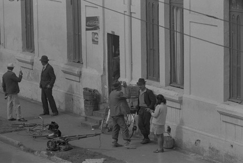 A group of men and women socializing, Bogotá, Colombia, 1976