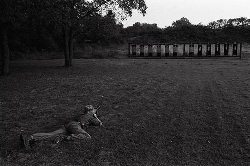 Survival school student shoots targets, Liberal, 1982