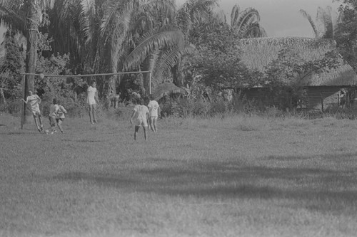 Youth playing soccer, La Chamba, Colombia, 1975