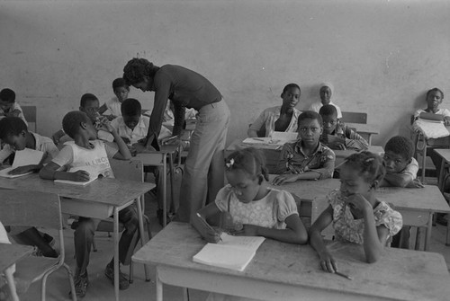 Teacher working with students, San Basilio del Palenque, ca. 1978