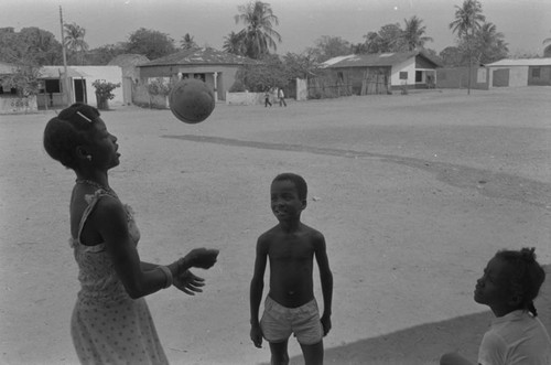 Children playing with a ball in the street, San Basilio de Palenque, ca. 1978