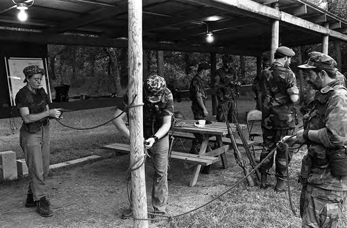 Survival school students tie rope, Liberal, 1982