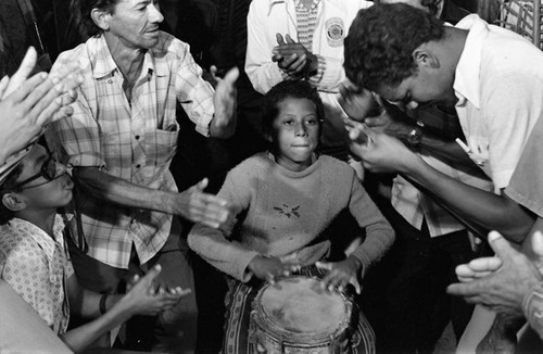 Boy playing the conga drum, Barranquilla, Colombia, 1977