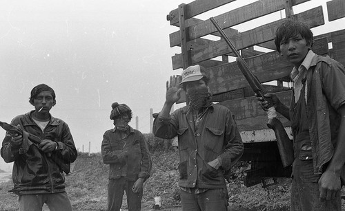 Sandinistas in the rain, Nicaragua, 1979