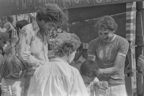 People at carnival covered in flour, Barranquilla, ca. 1978