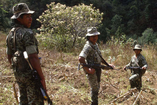 Armed soldiers on patrol, Guatemala, 1982