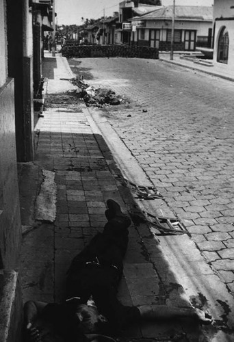 Dead man on a street, Nicaragua, 1979