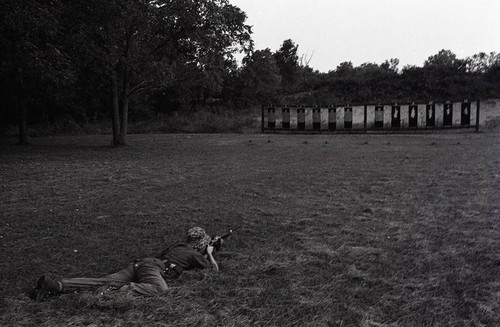 Survival school student shoots targets, Liberal, 1982