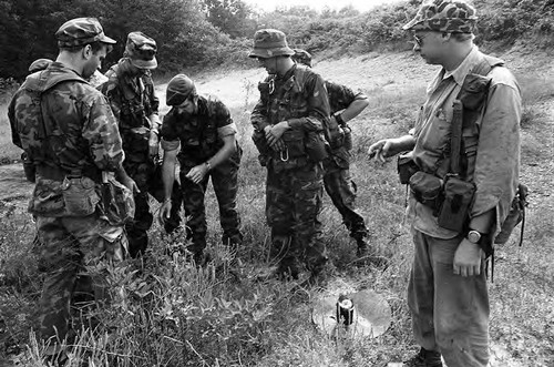 Survival school students learn about explosives, Liberal, 1982