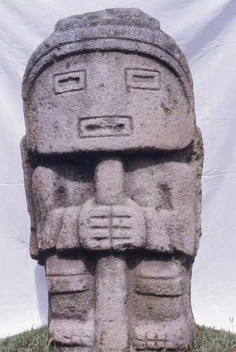 Stone statue with a mask-like face, San Agustín, Colombia, 1975