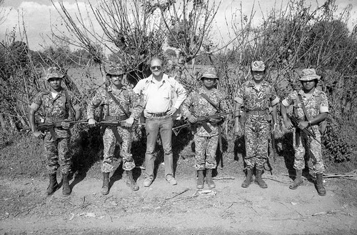 Unidentified man with group of soldiers, Guatemala, 1982