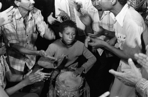 Boy playing the conga drum, Barranquilla, Colombia, 1977