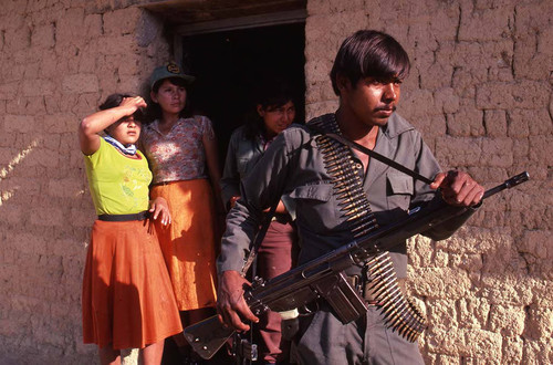 Three women and an armed guerrillero, La Palma, Chalatenango, 1983