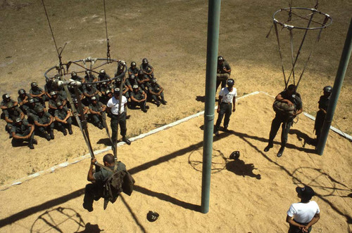 Cadets practice parachuting with supervision, Ilopango, San Salvador, 1983