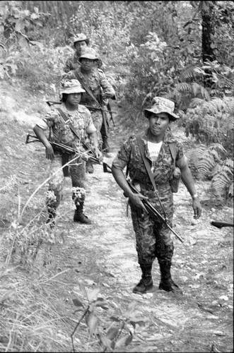Four soldiers on patrol, Guatemala, 1982