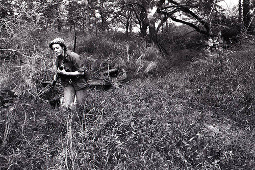 Survival school student holds a rifle, Liberal, 1982