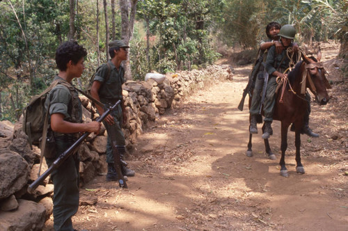 Soldiers patrolling the mountains near San Antonio de los Ranchos, Chalatenango, El Salvador, 1981