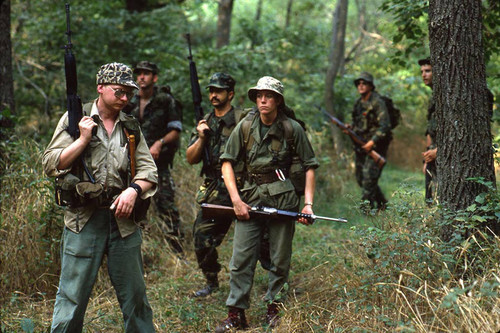 Survival school students participate in an obstacle course, Liberal, 1982