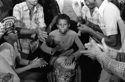 Boy playing the conga drum, Barranquilla, Colombia, 1977