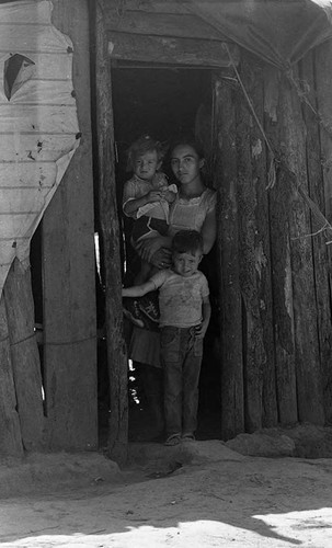 Refugee mother and her children, Perquín, Morazán, 1983