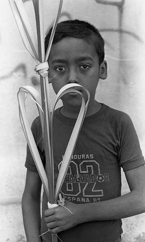 Boy with palm, San Agustín, Usulután, 1983