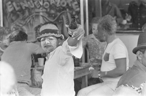 Men sitting at a restaurant, Barranquilla, Colombia, 1977