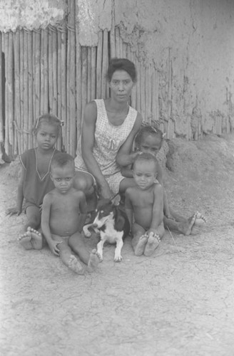 Woman surrounded by children, San Basilio de Palenque, 1976