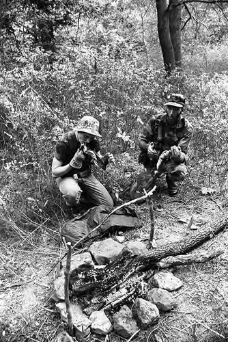 Survival school students eat a rabbit, Liberal, 1982