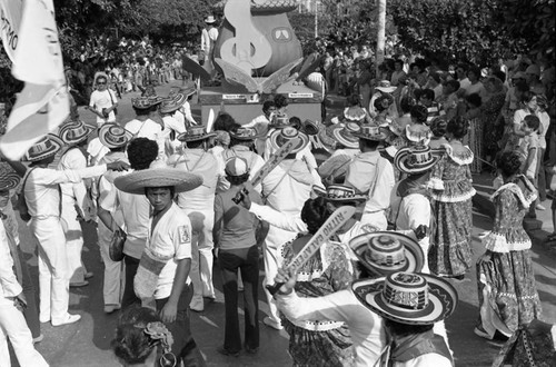 Dancers following a float, Barranquilla, Colombia, 1977