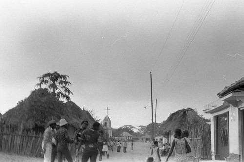 Men, women, and children gathering in the street, San Basilio de Palenque, 1976