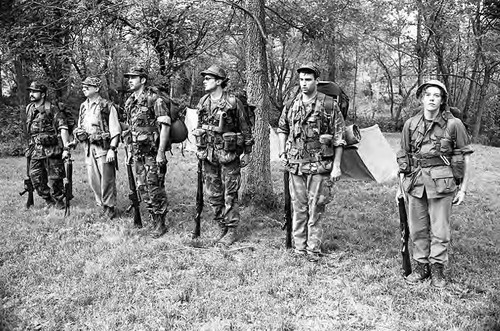 Survival school students form a military-style lineup, Liberal, 1982