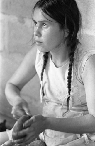 Woman crafting a clay bowl, La Chamba, Colombia, 1975