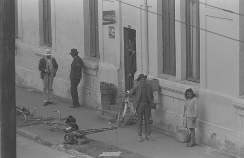 A group of men and women socializing, Bogotá, Colombia, 1976