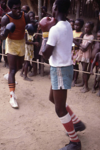 Boxers fighting inside boxing ring, San Basilio de Palenque, 1976