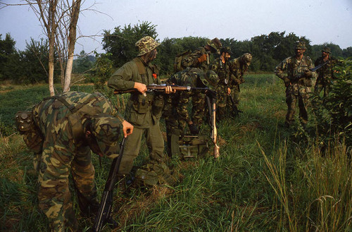 Survival school students form a military-style lineup, Liberal, 1982