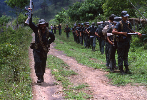 A group of Contra soldiers stand in line, Nicaragua, 1983