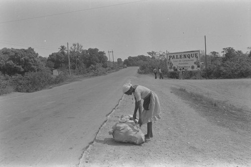 Woman setting up vendor stand, Cartagena Province, ca. 1978