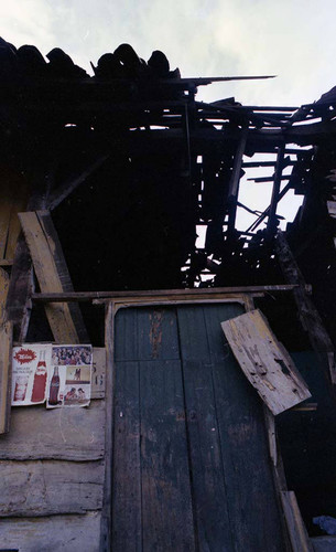 View of a building with a destroyed roof, Managua, 1979